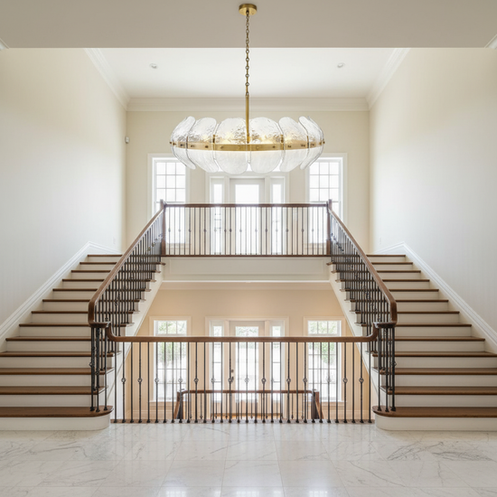 Luster Gaze Veridian Bloom Heritage Brass Chandelier - dramatic American stairwell with soaring ceiling